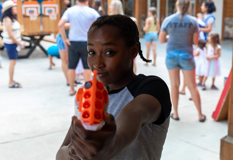 Carnival Games, girl with blaster gun
