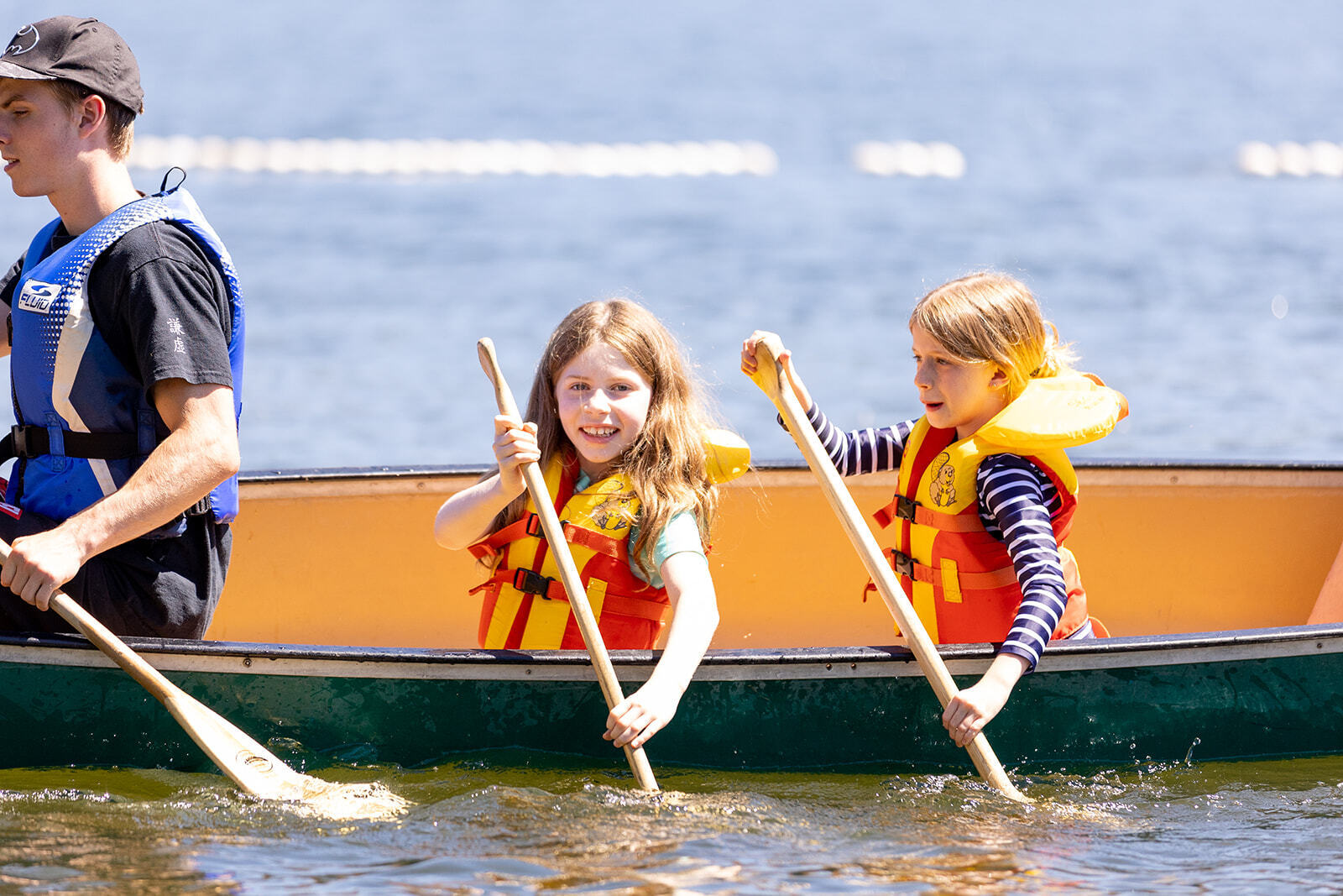 two campers canoeing