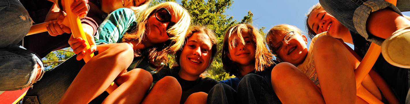 Girls cabin sitting in a half circle